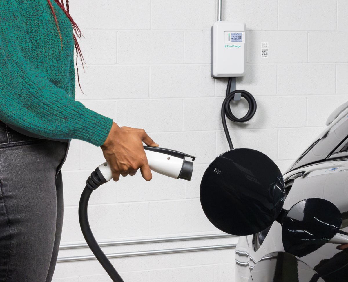 teal-sweater-user-charging
